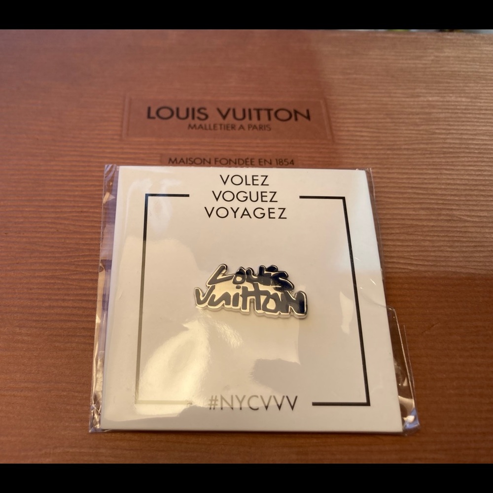 LOUIS VUITTON “Volez, Voguez, Voyage” Exhibit Pin